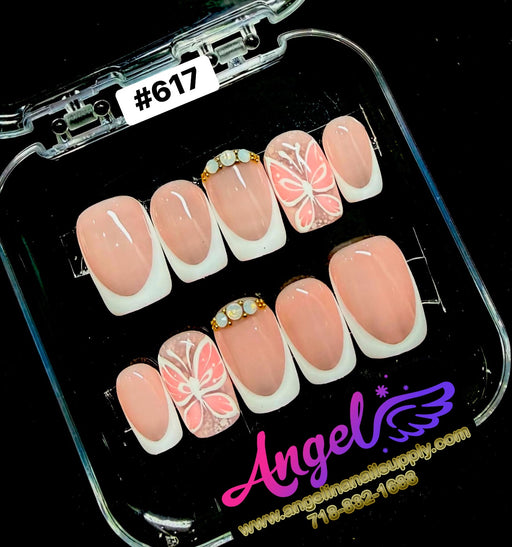 Set of decorative nails in a clear case with 'Angel' branding.